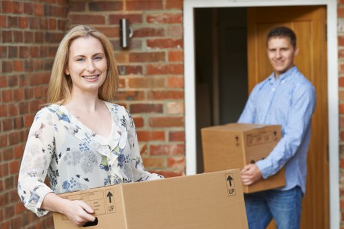 Loading furniture into a removals van in Catford