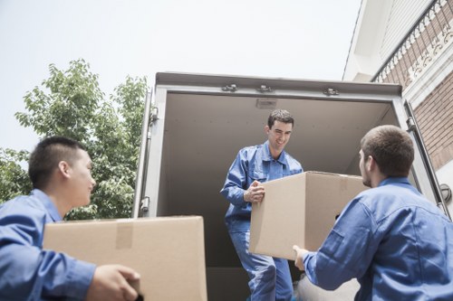 Loading furniture into a van for a Catford removal job