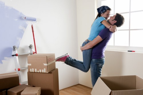 Specialist movers securing a piano for safe relocation