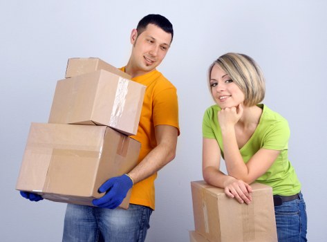 Coordinated office move with furniture and boxes ready for transport