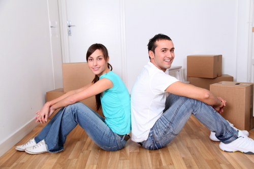 Boxes and furniture being prepared for a Catford apartment relocation